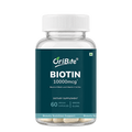 A clear plastic bottle of OriBite Biotin 10000mcg dietary supplement with a white cap and a dark teal label, containing 60 vegan capsules.