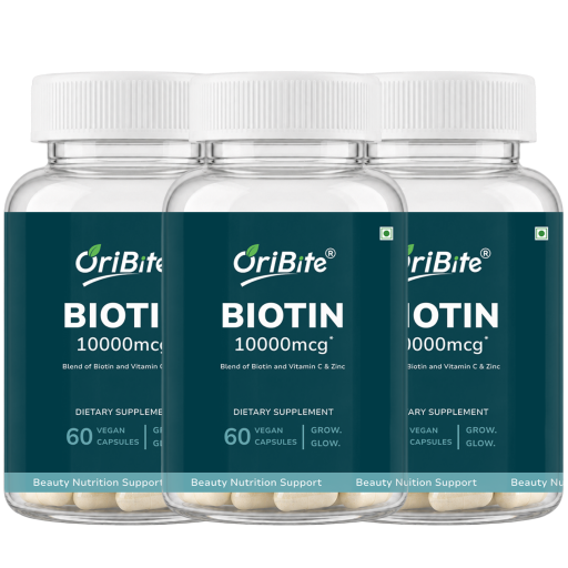 Three clear plastic bottles of OriBite Biotin 10000mcg dietary supplements with white ribbed caps and dark teal labels, arranged in a clean studio shot.