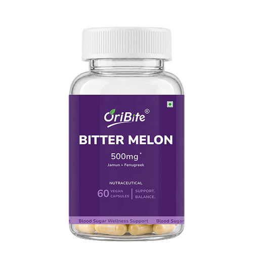 A clear plastic bottle of OriBite Bitter Melon 500mg dietary supplement capsules, featuring a prominent purple label and a white cap, set against a plain white background.