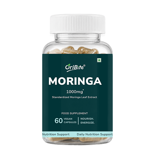 A bottle of OriBite Moringa 1000mg food supplement capsules, featuring a dark green label and a white cap, shown on a solid white background.
